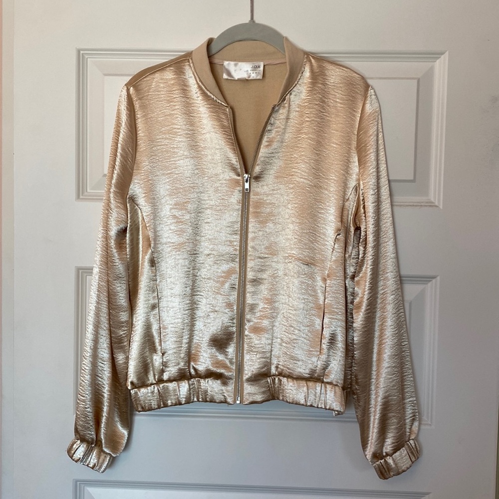 Gold shimmery jacket. Worn three times.